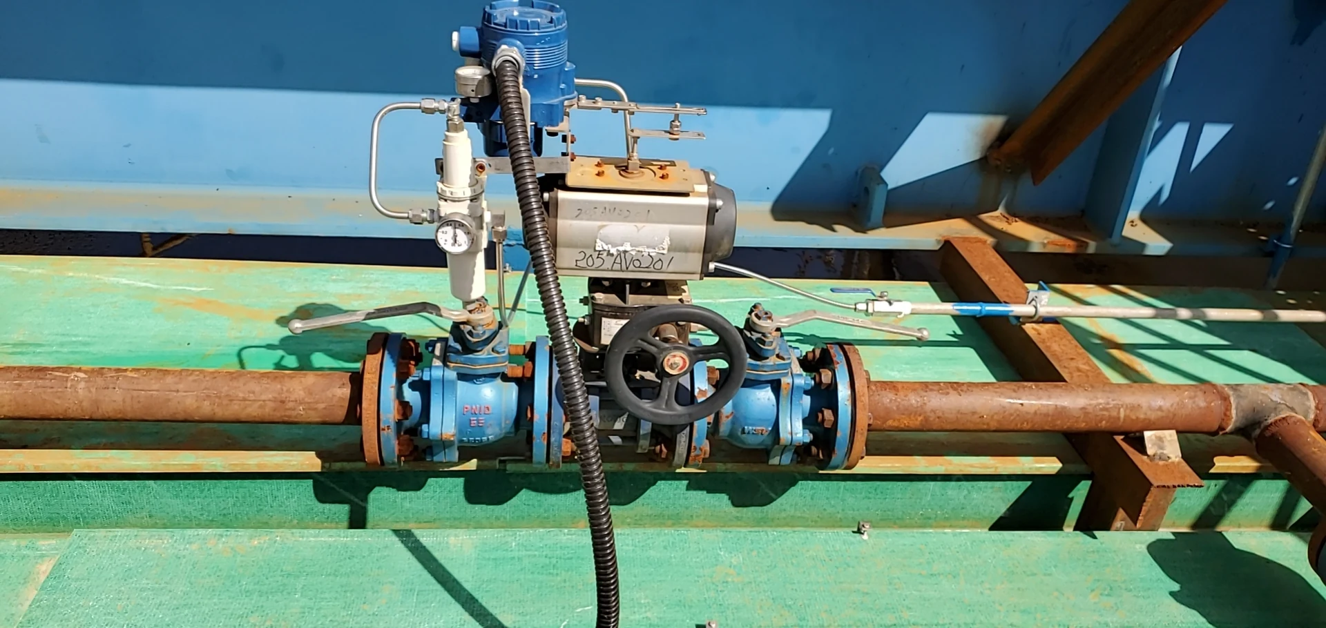 A pneumatic valve in outdoor hydrometallurgical pipework